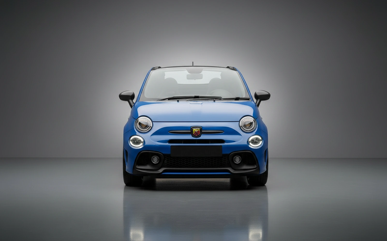 Abarth 695 Turismo Blue 2023 — exterior side view
