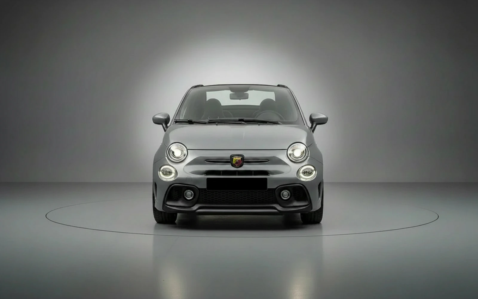 Abarth 695 Turismo Grey 2023 — exterior side view