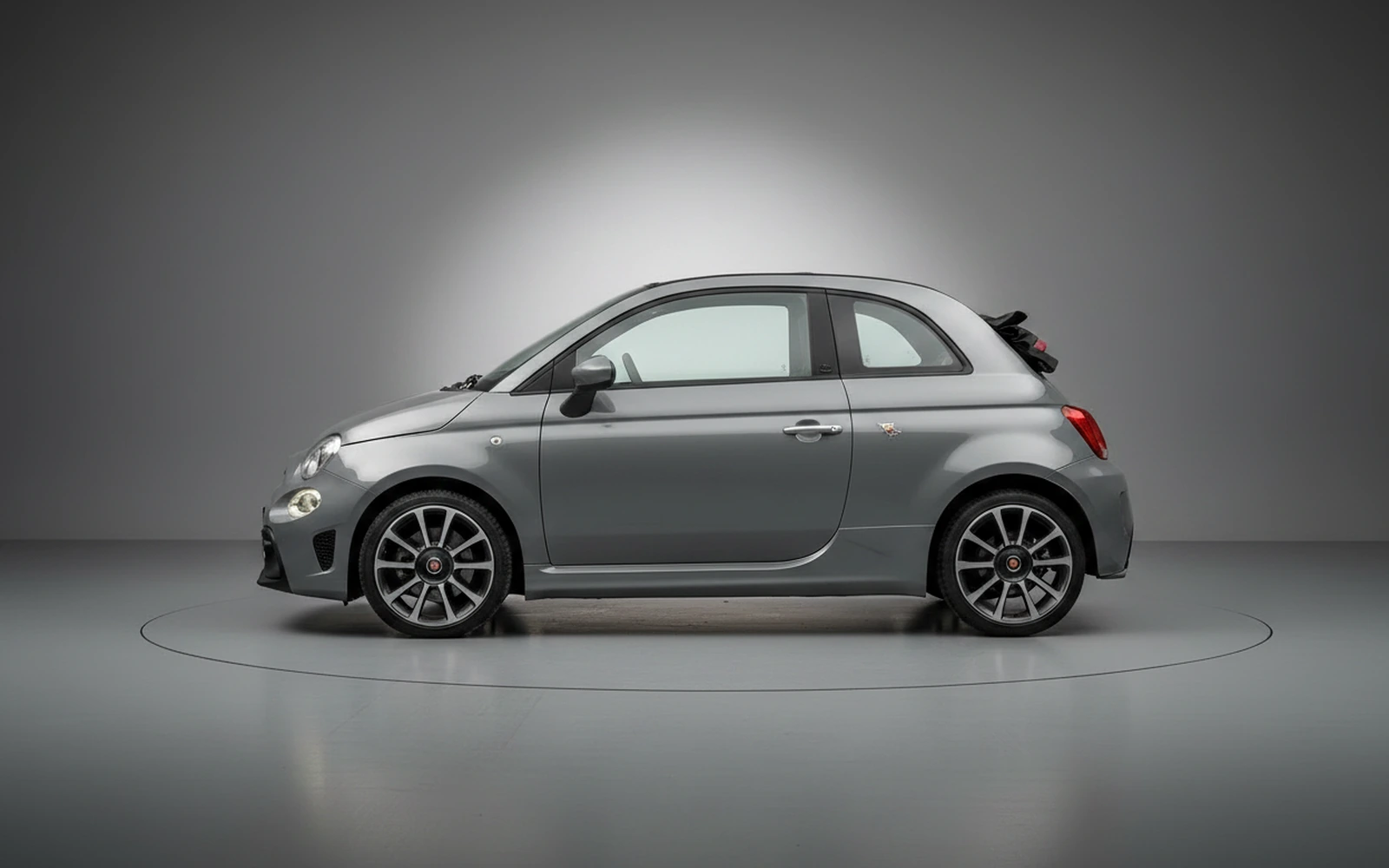 Abarth 695 Turismo Grey 2023 — exterior rear view