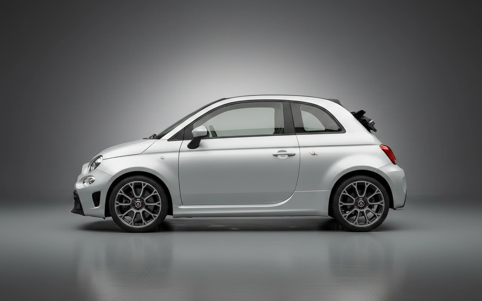 Abarth 695 Turismo Silver 2023 — exterior rear view