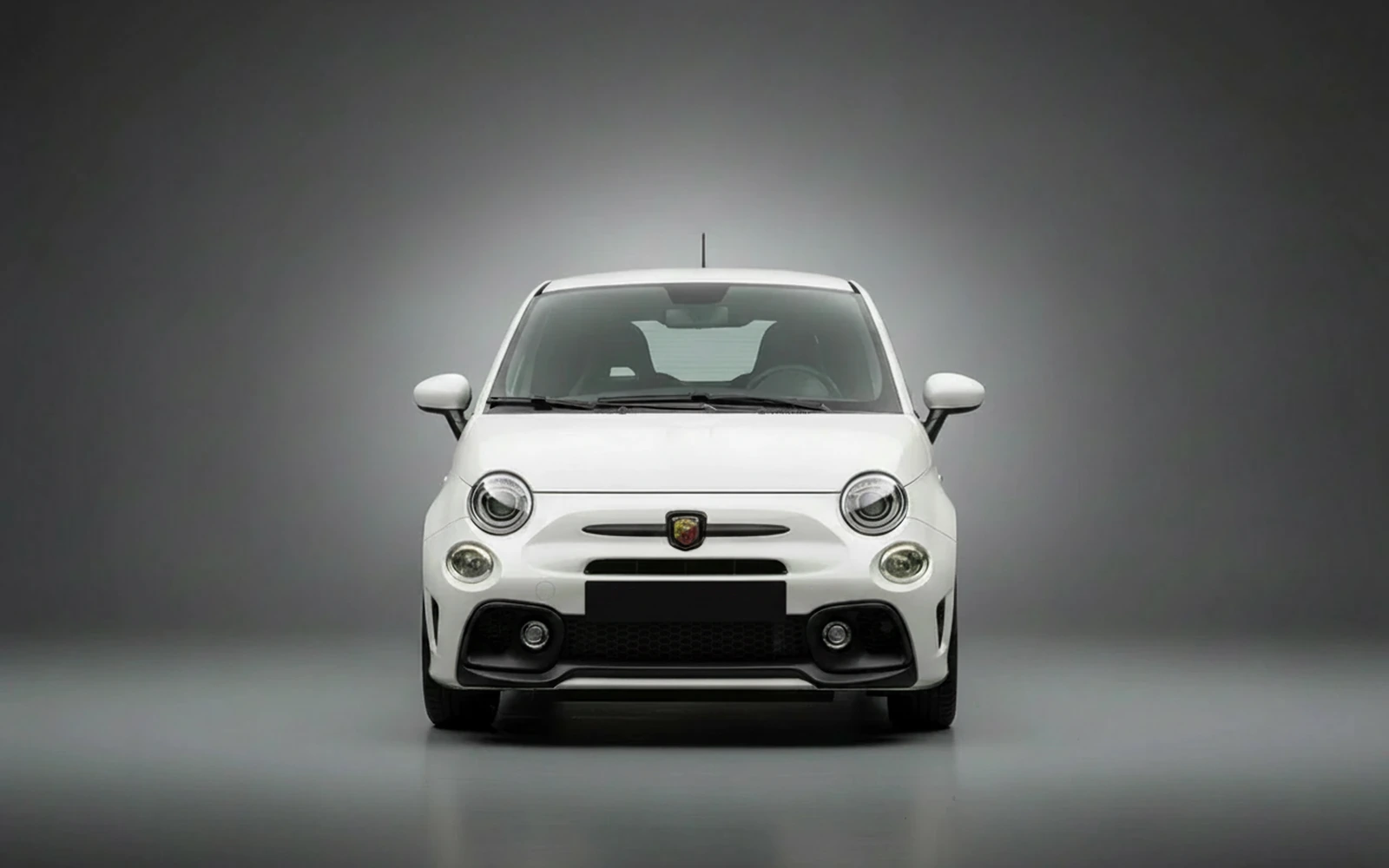 Abarth 695 Turismo White 2024 — exterior side view