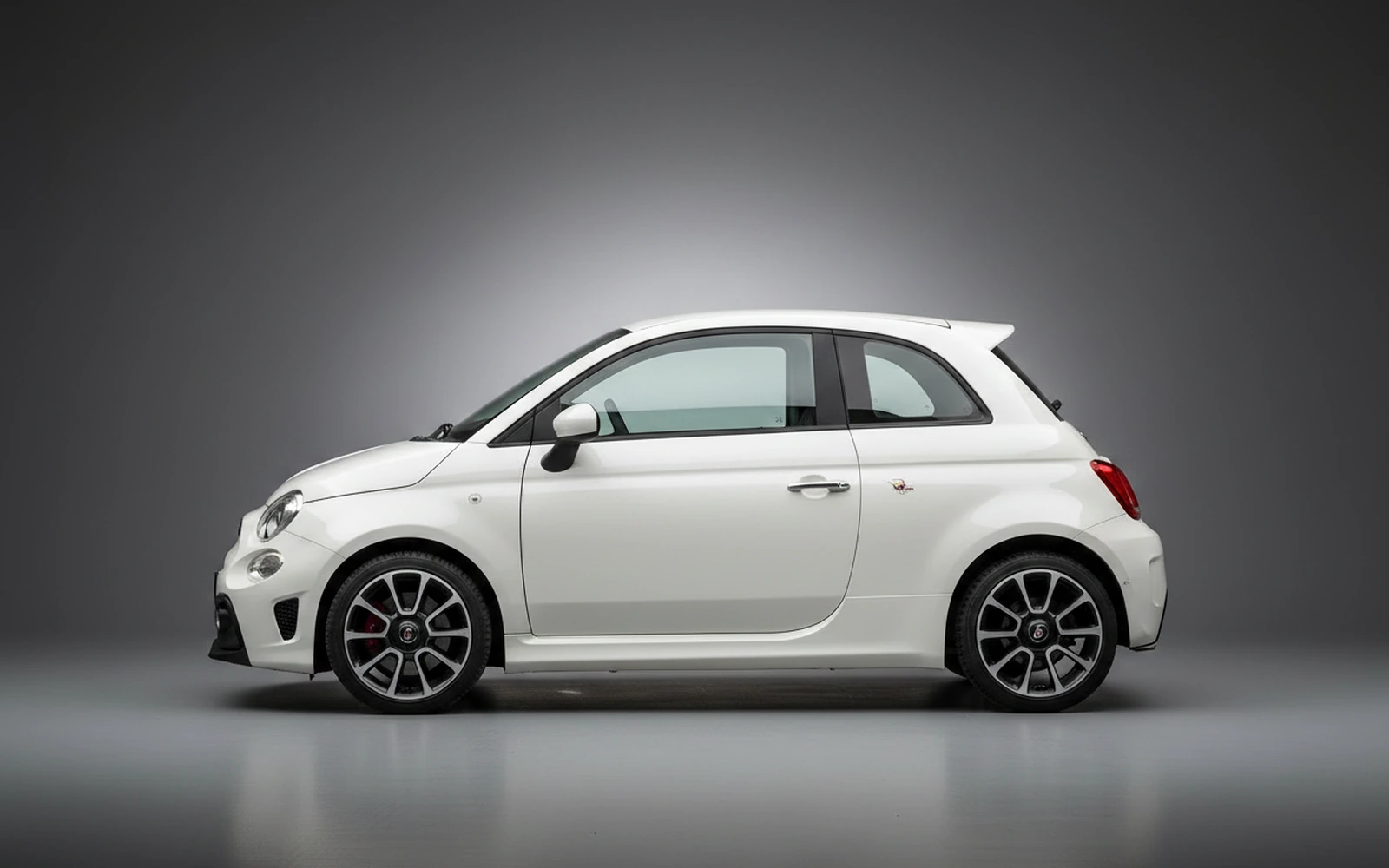Abarth 695 Turismo White 2024 — exterior rear view