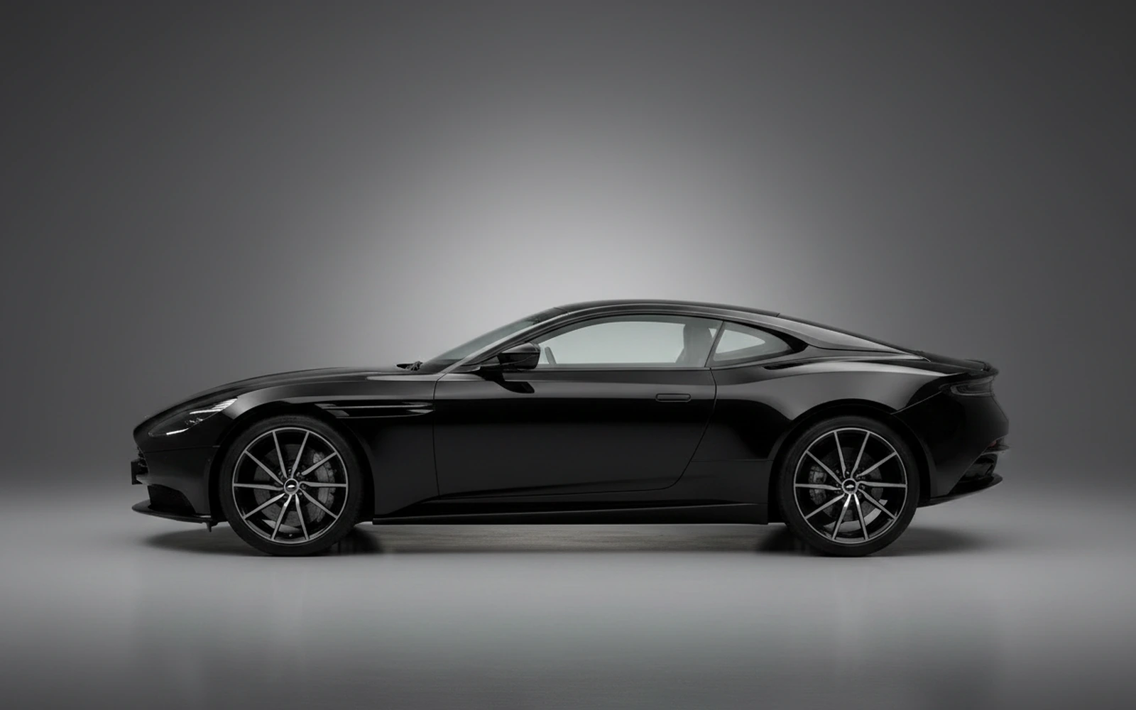 Aston Martin DB11 Black 2019 — exterior rear view