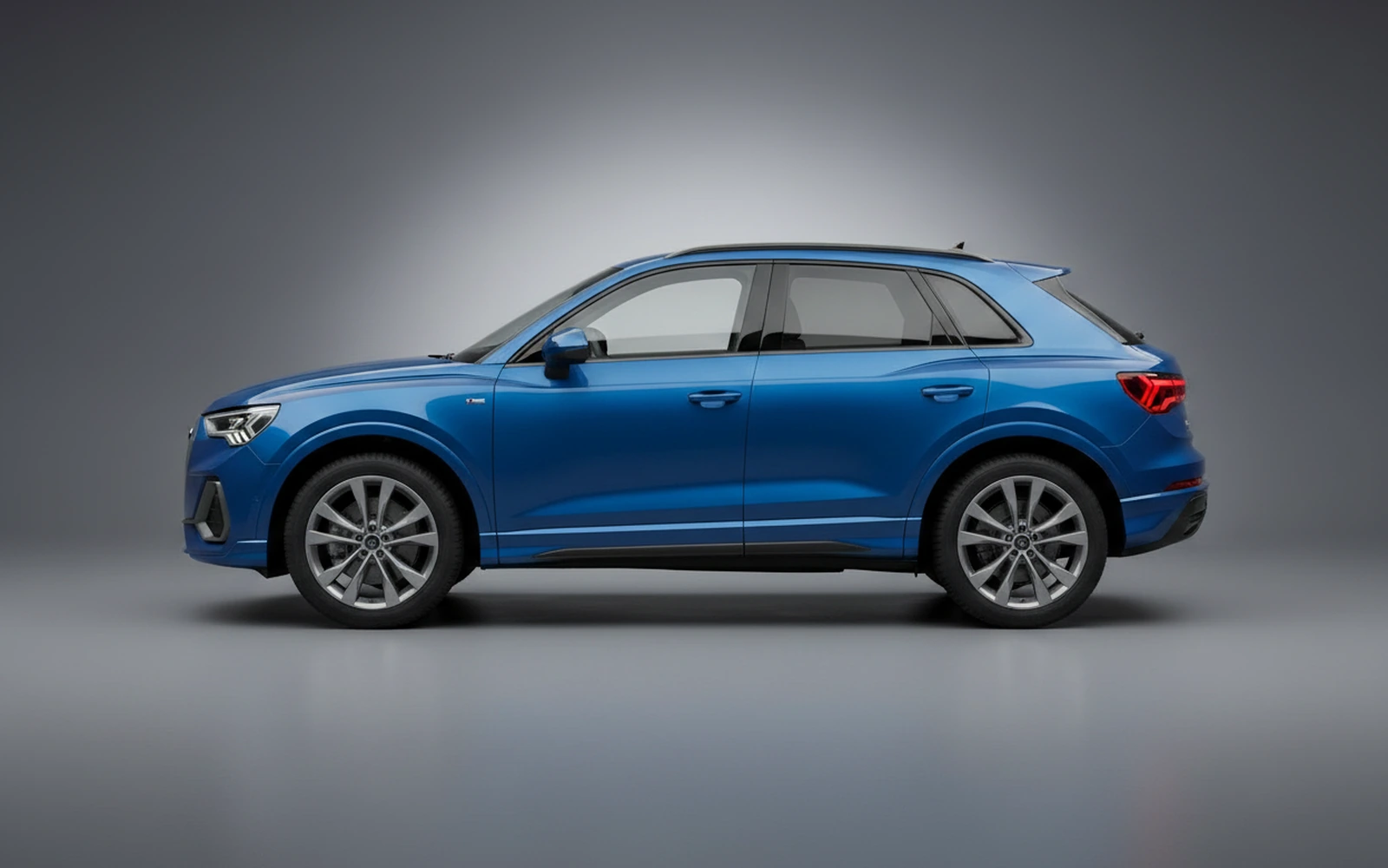 Audi Q3 Blue 2024 — exterior rear view