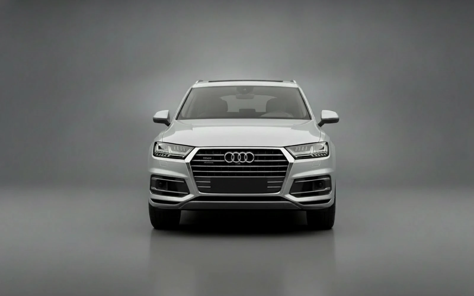 Audi Q7 Silver 2023 — exterior side view