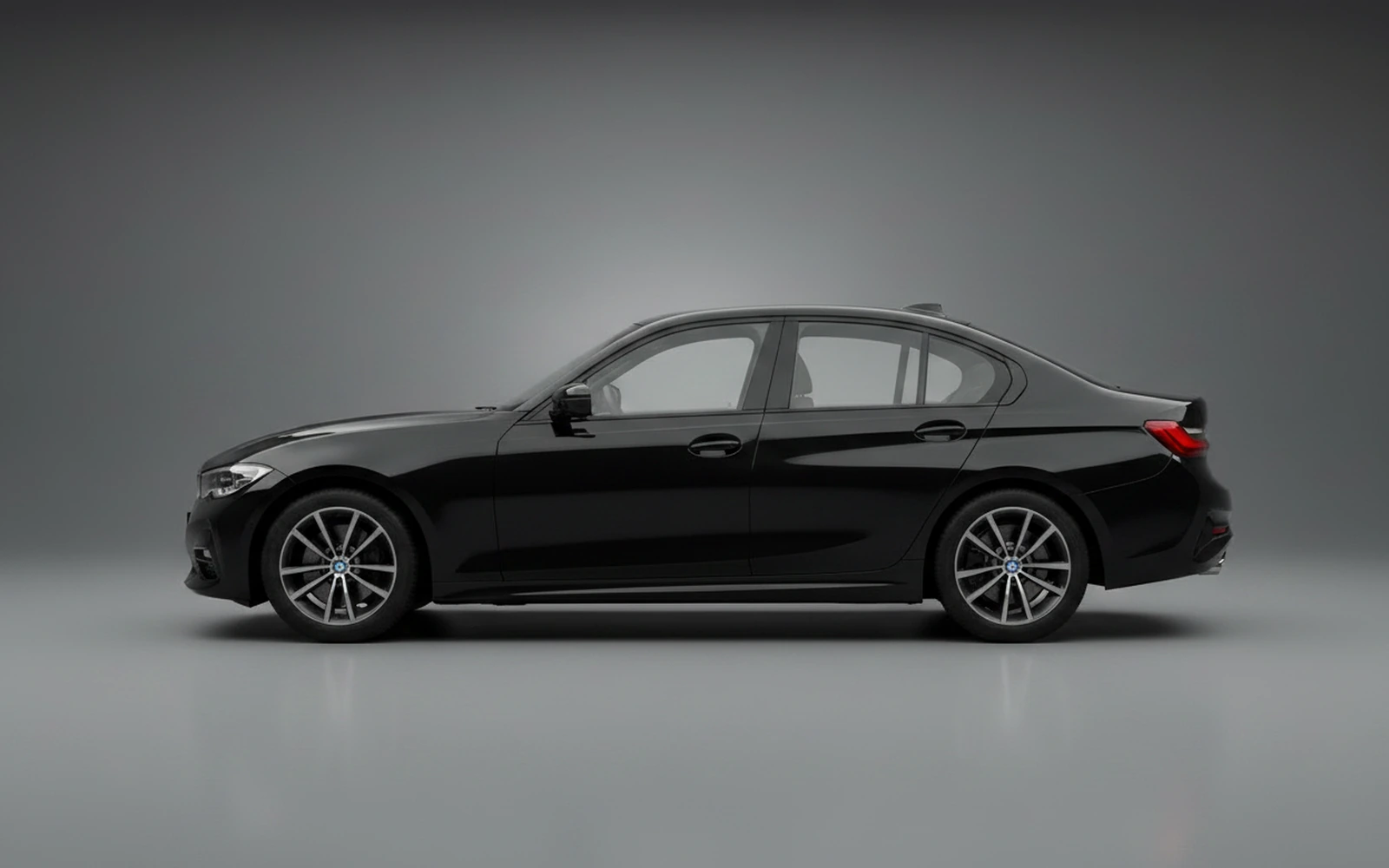 BMW 330 Black 2024 — exterior rear view