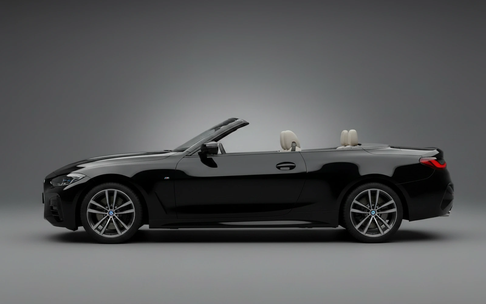 BMW 430i xDrive Convertible Black 2022 — exterior rear view