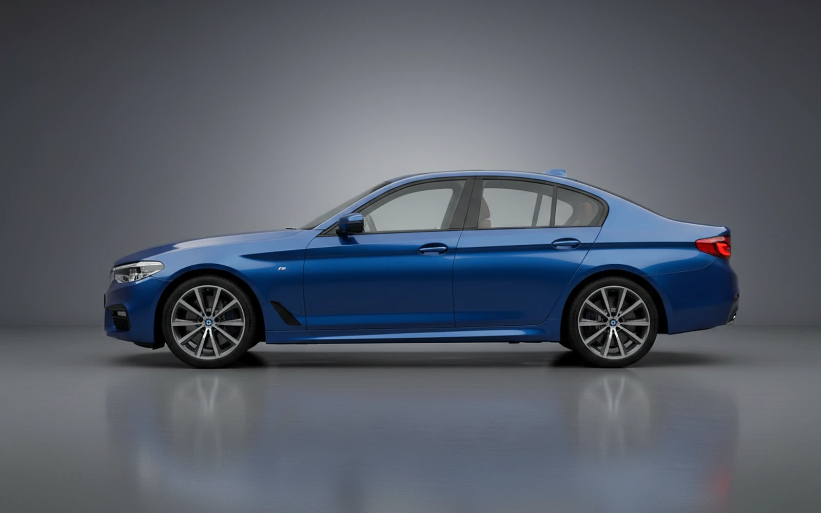 BMW 5 Series 530i Blue 2024 — exterior rear view