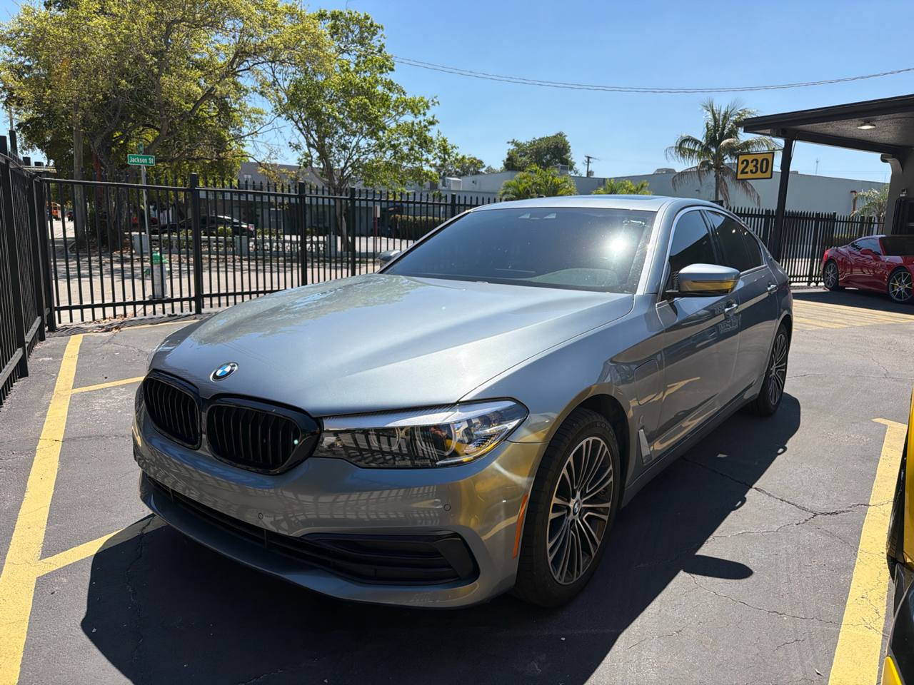 BMW 5 Series M550i Grey for rent in Miami — exterior photo
