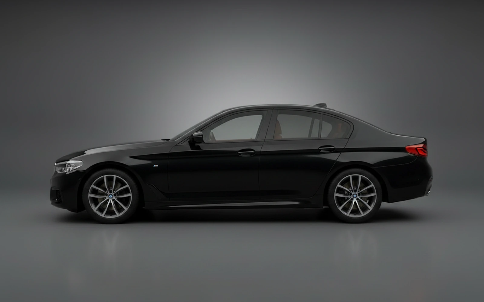 BMW 520 Black 2024 — exterior rear view