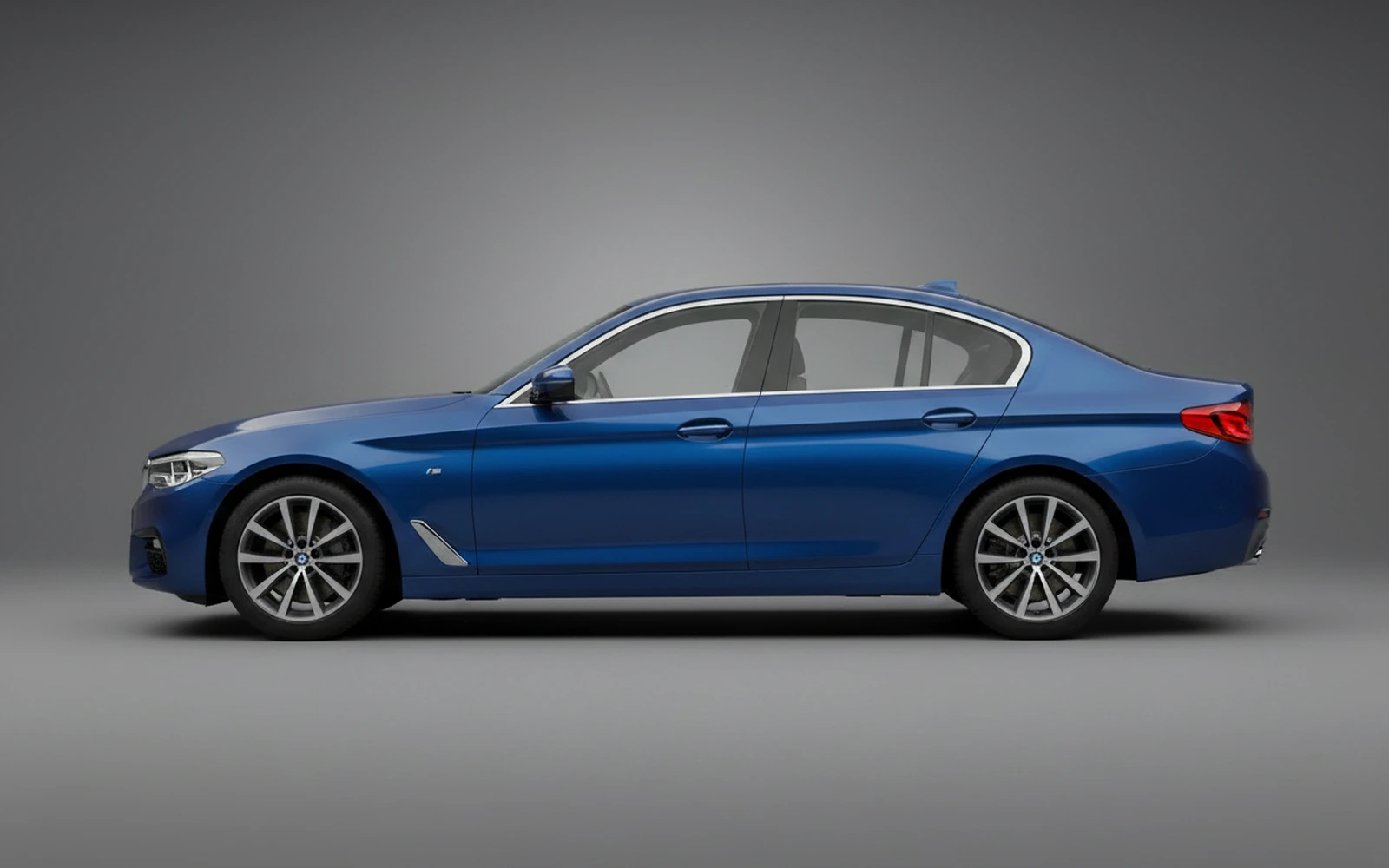 BMW 520 Blue 2024 — exterior rear view