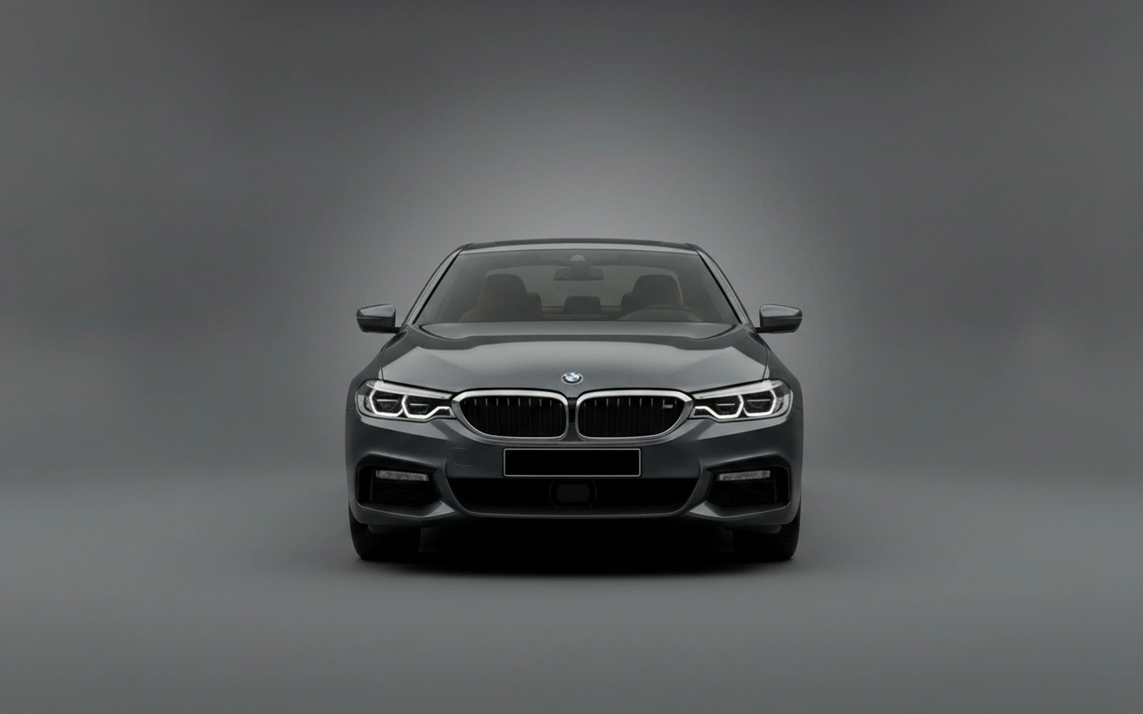 BMW 520i Grey 2025 — exterior side view