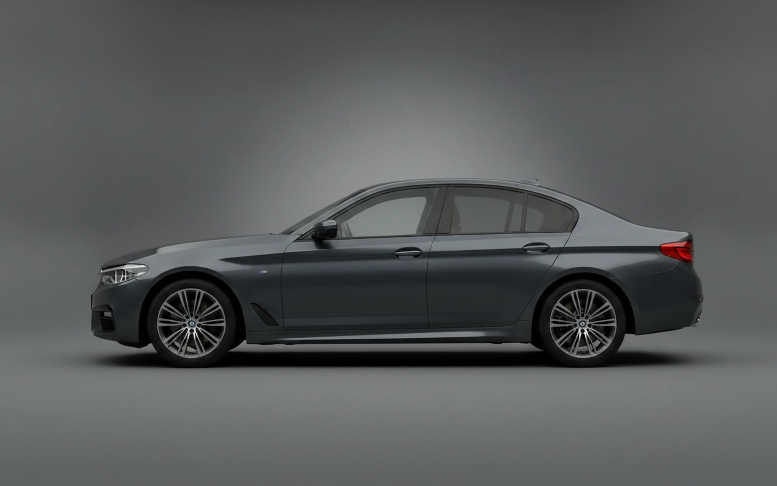 BMW 520i Grey 2025 — exterior rear view