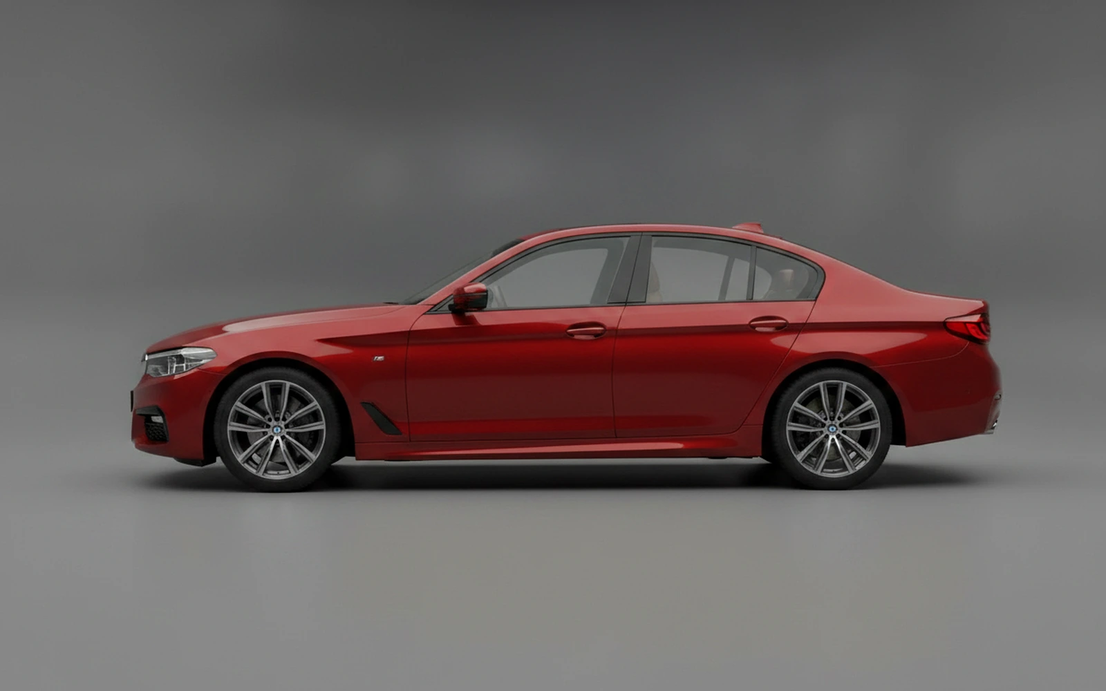 BMW 520i Red 2023 — exterior rear view