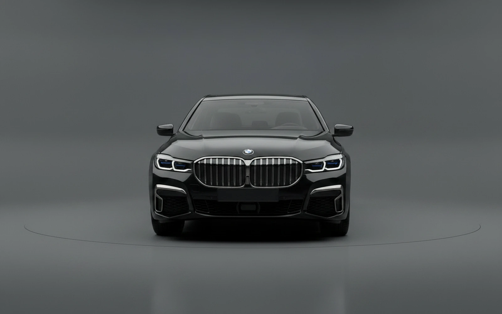 BMW 740 M Sport Black 2024 — exterior side view