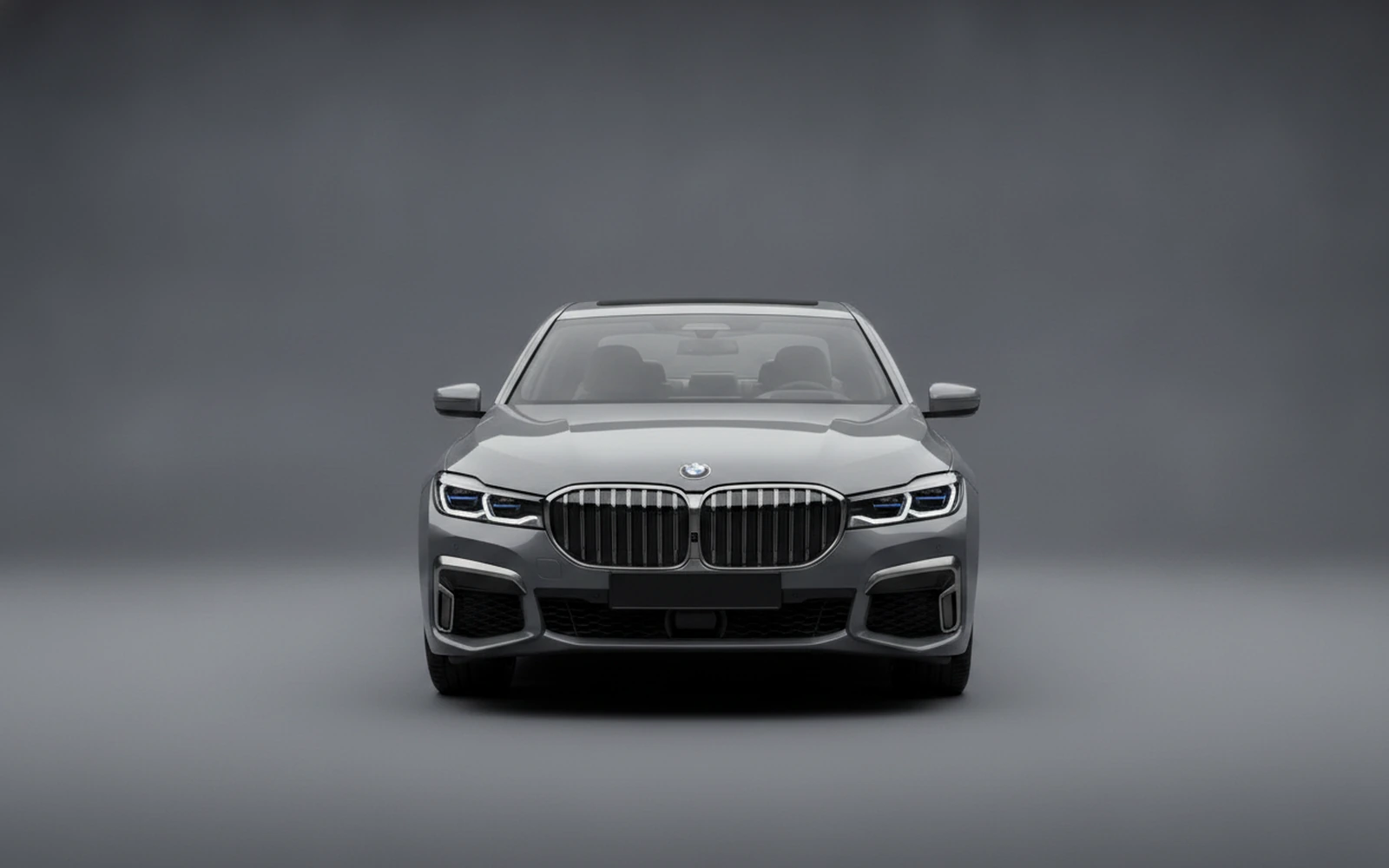 BMW 740 M Sport Grey 2022 — exterior side view