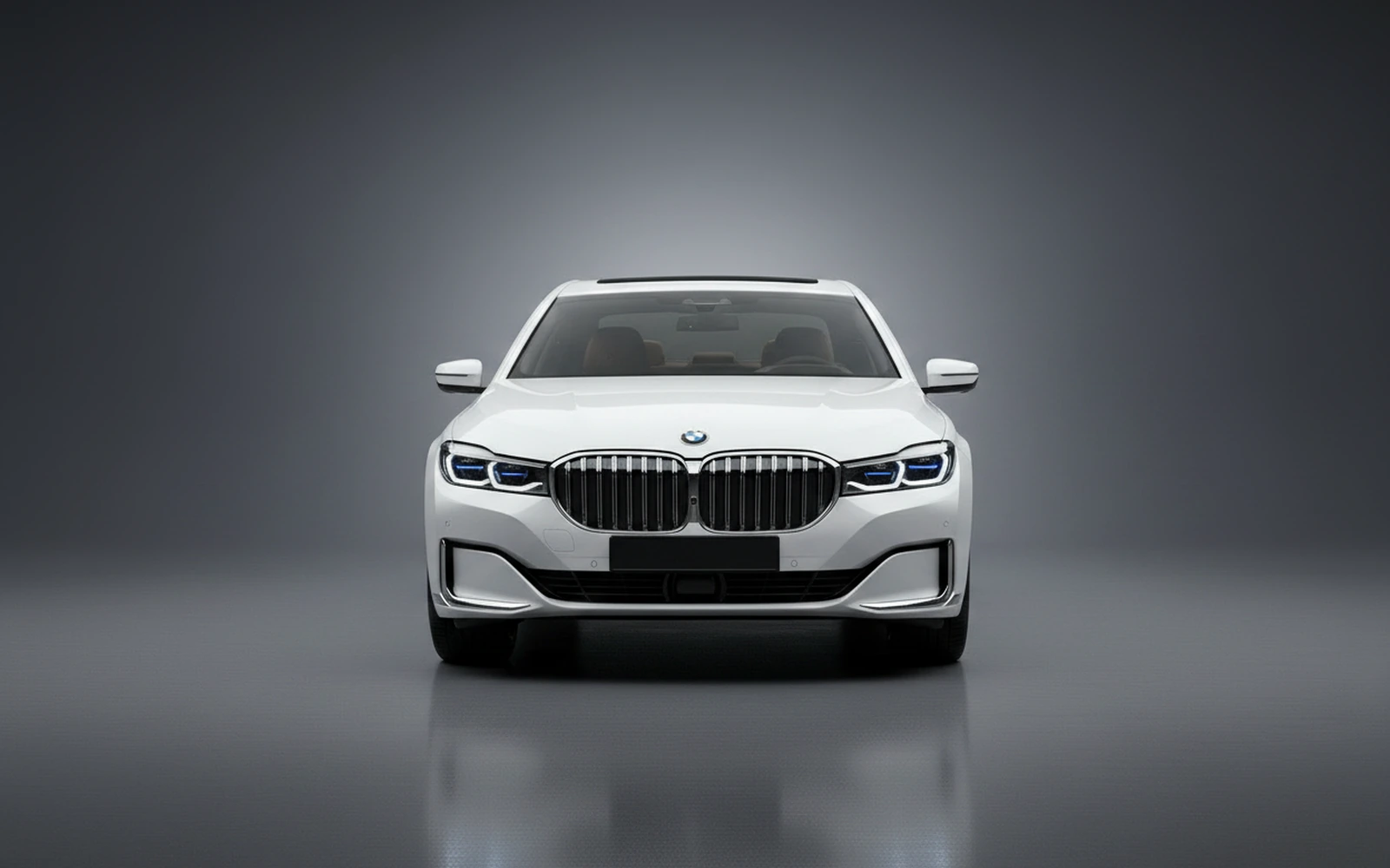 BMW 740 M Sport White 2022 — exterior side view
