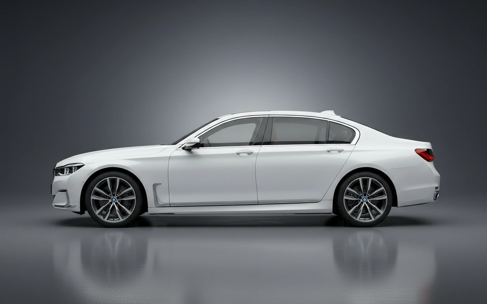 BMW 740 M Sport White 2022 — exterior rear view