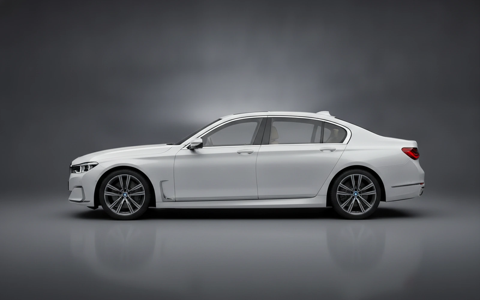 BMW 740i Individual Silver White 2022 — exterior rear view