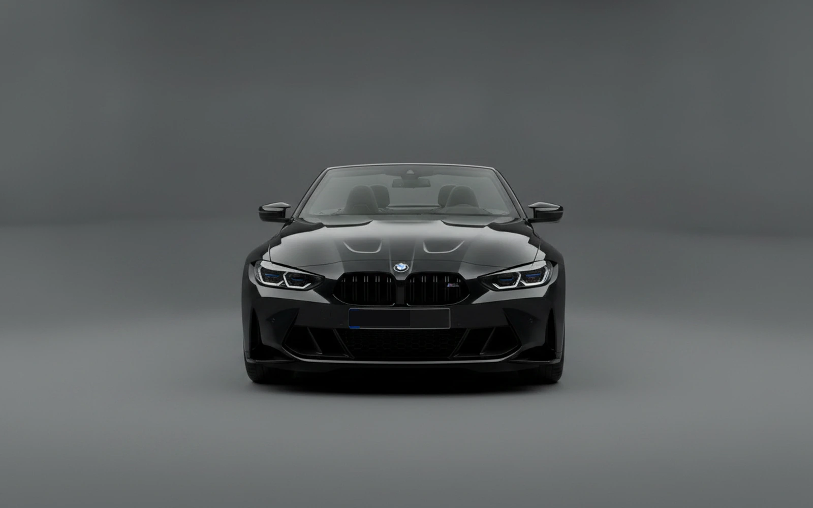 BMW M4 Competition Convertible Black 2022 — exterior side view