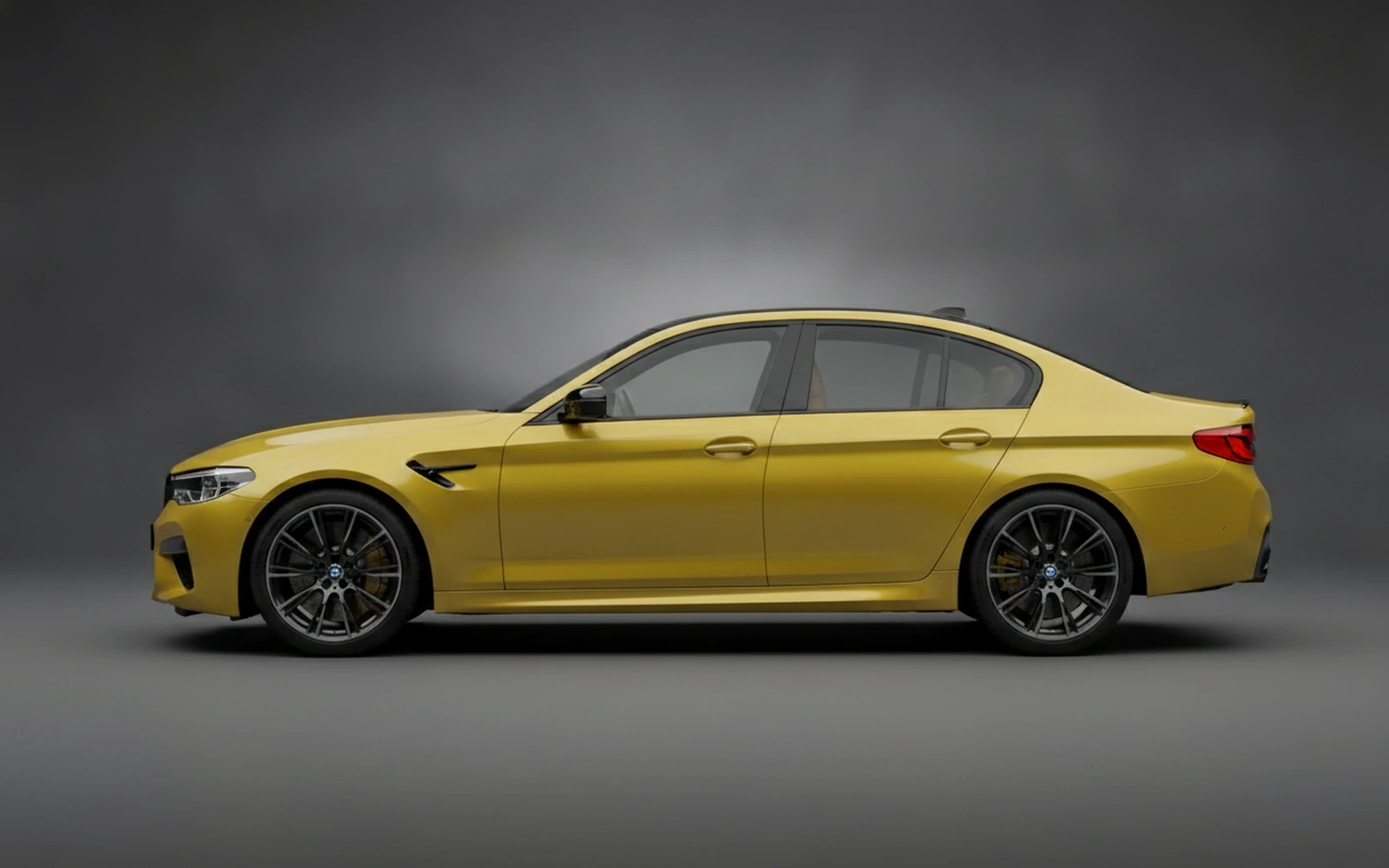 BMW M5 Competition Yellow 2023 — exterior rear view