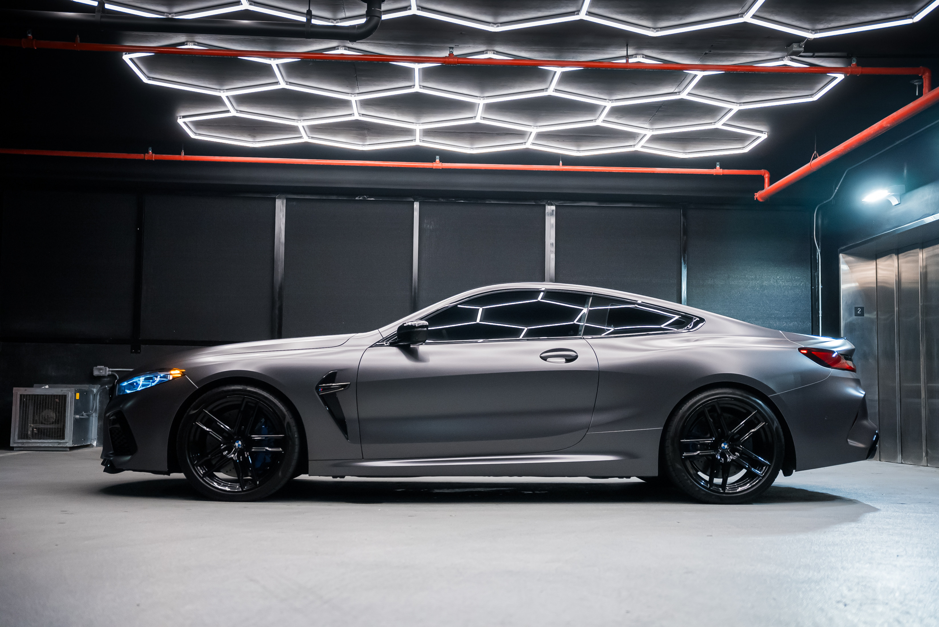 BMW M8 Competition Blue — exterior side view