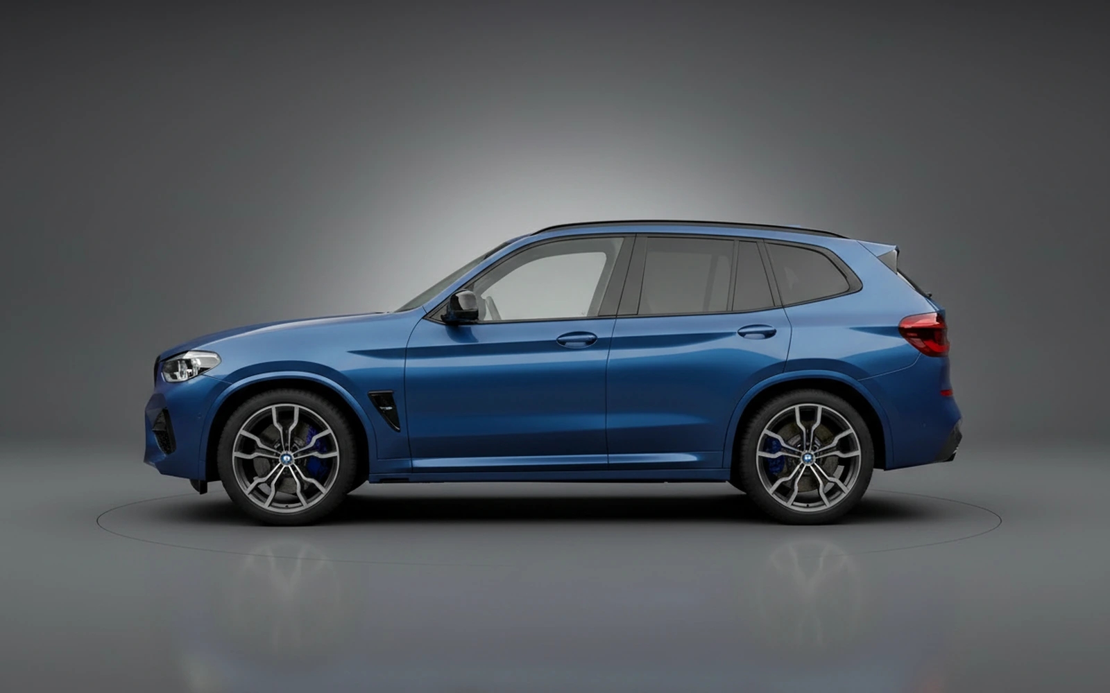 BMW X3M Competition Azul 2022 — exterior rear view