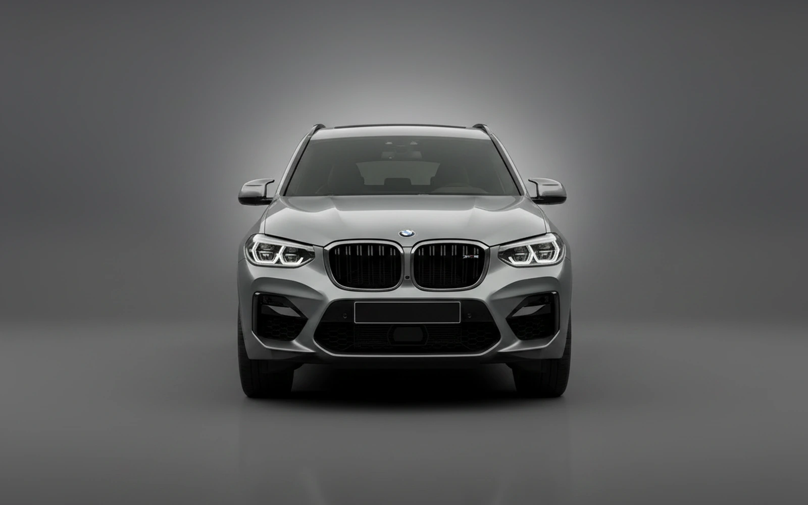 BMW X3M Competition Gris 2022 — exterior side view