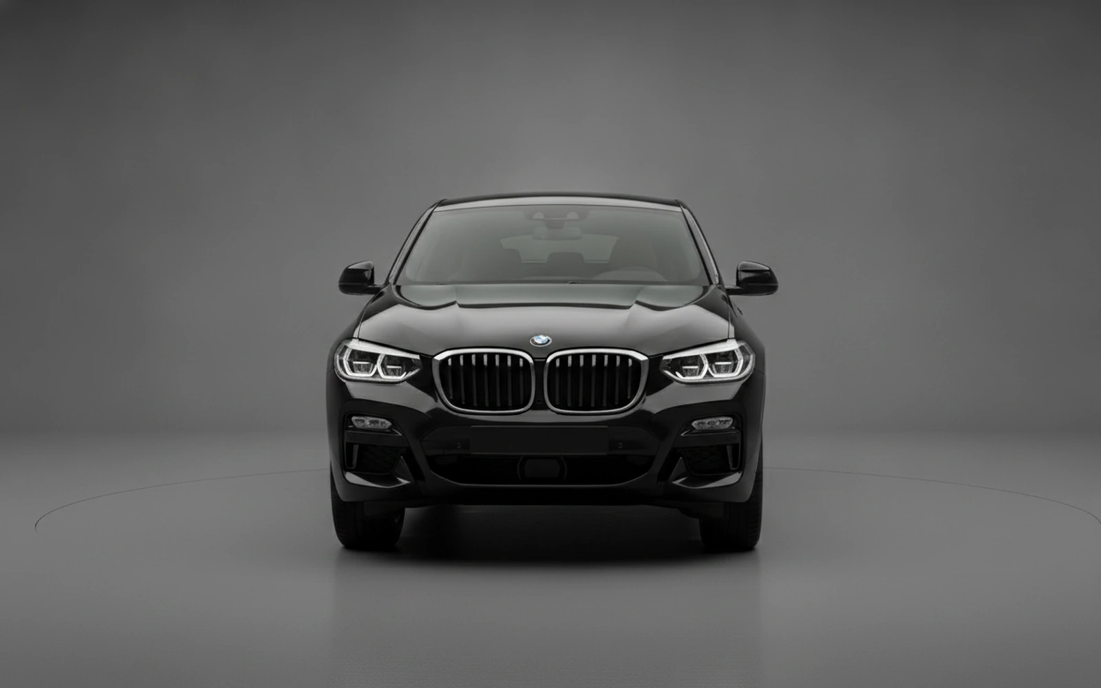 BMW X4 Black 2024 — exterior side view