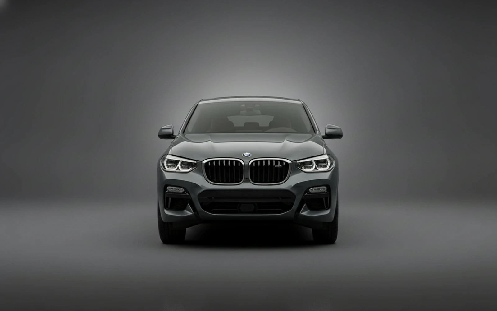 BMW X4 xDrive30i Grey 2023 — exterior side view