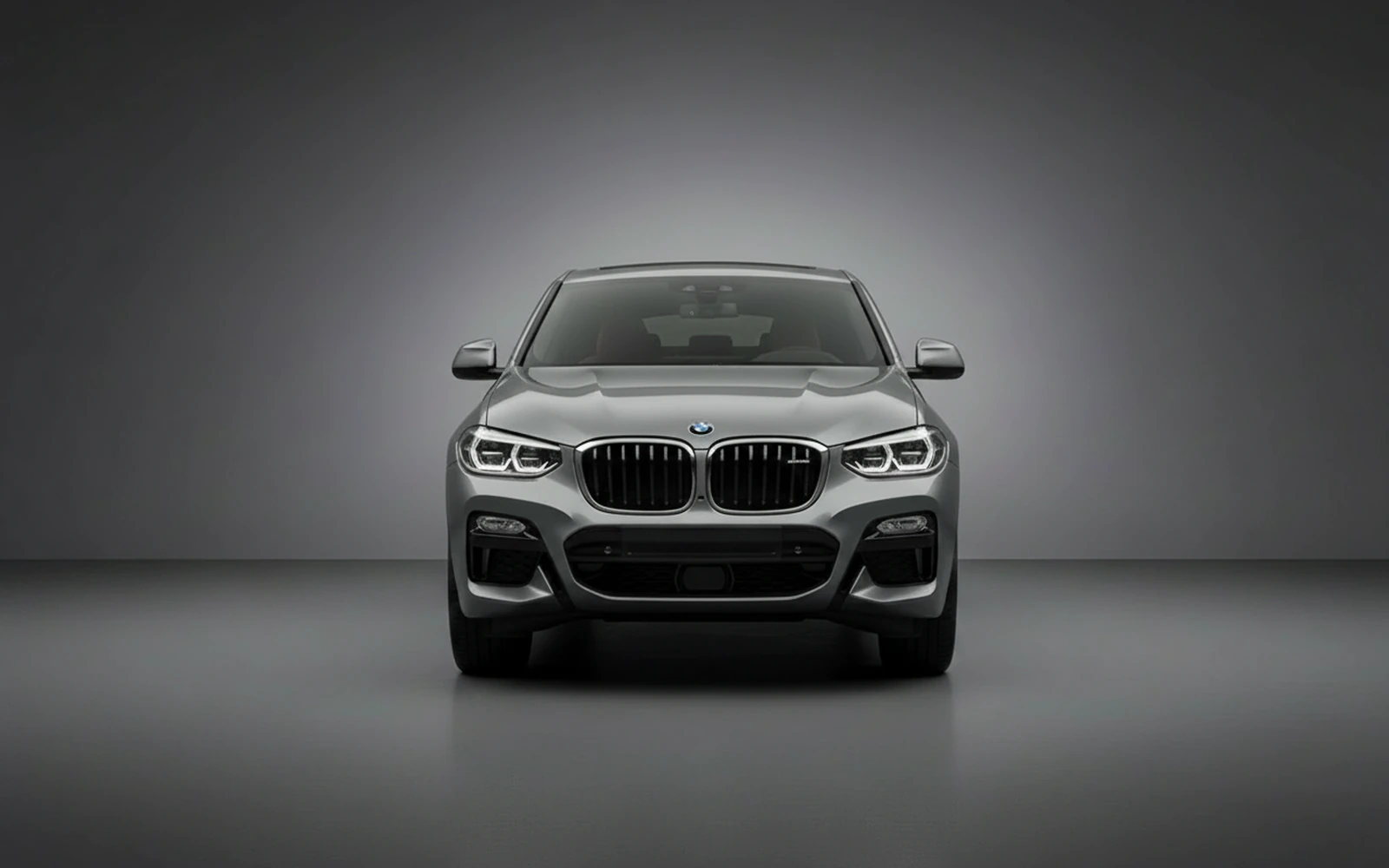 BMW X4 M40i Grey 2023 — exterior side view