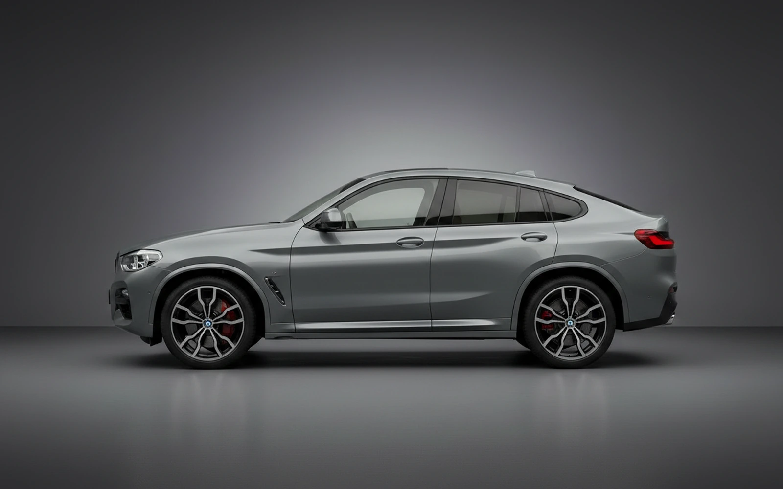 BMW X4 M40i Grey 2023 — exterior rear view
