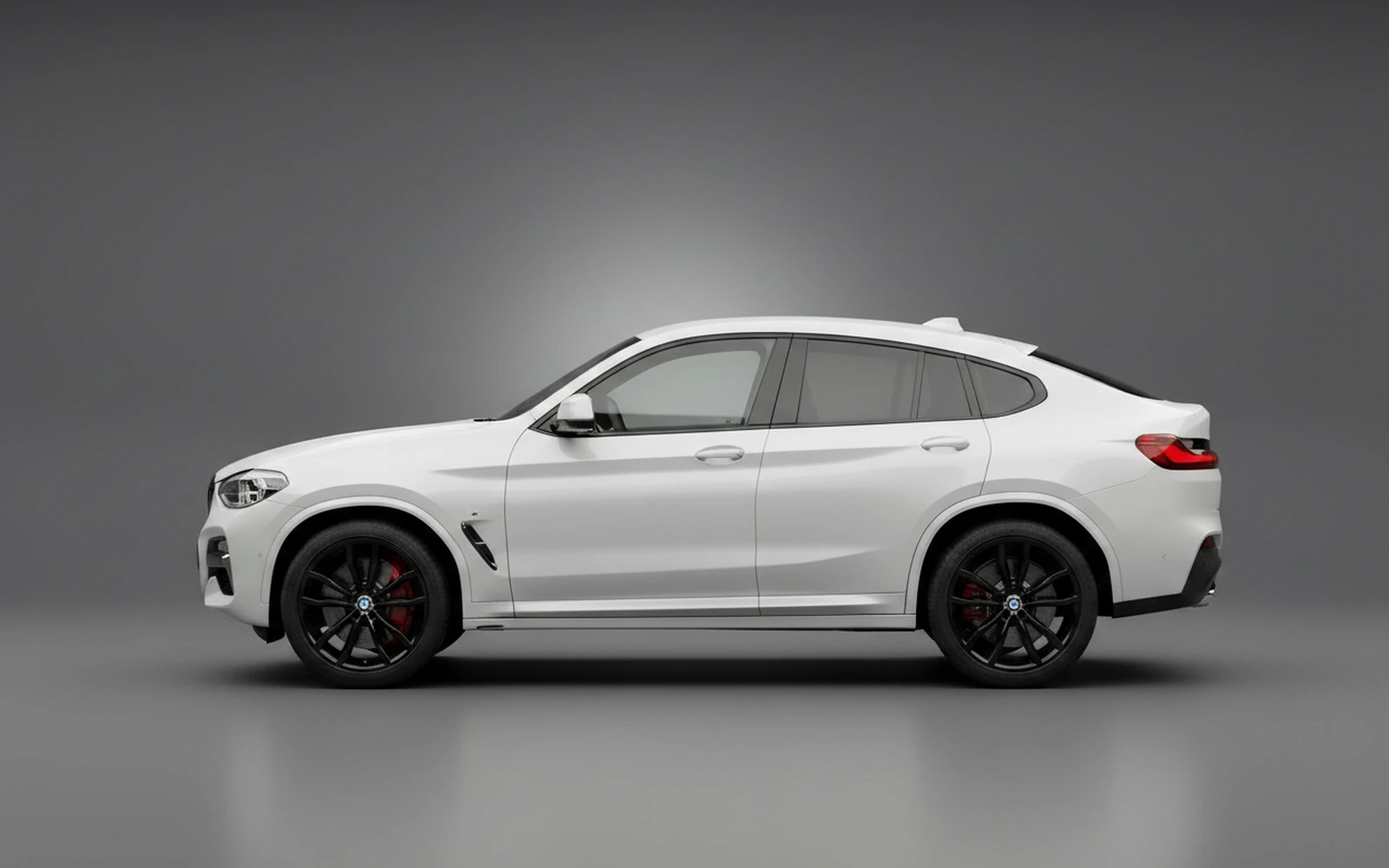 BMW X4 M40i White 2023 — exterior rear view