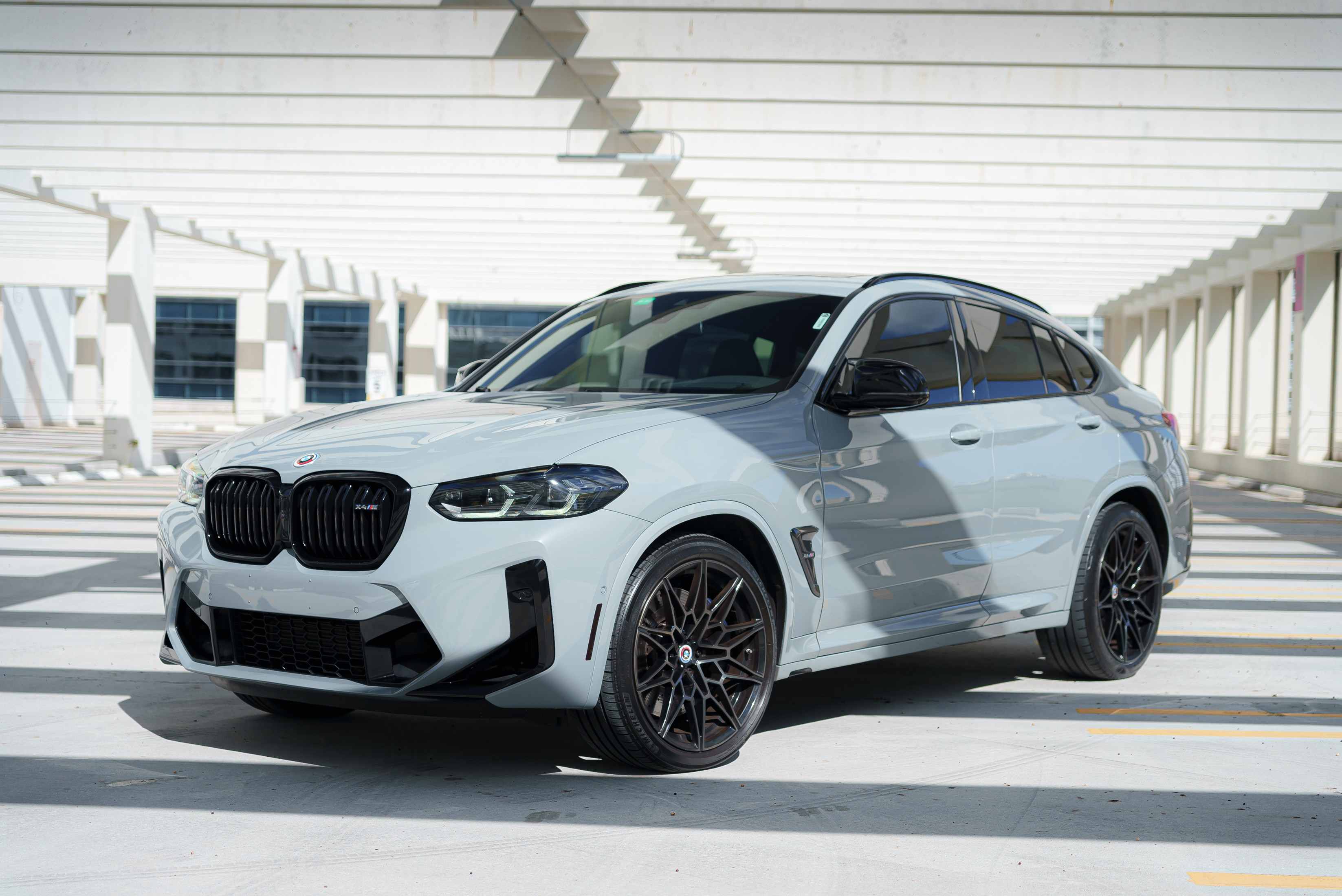 BMW X4m Black for rent in Miami — exterior photo