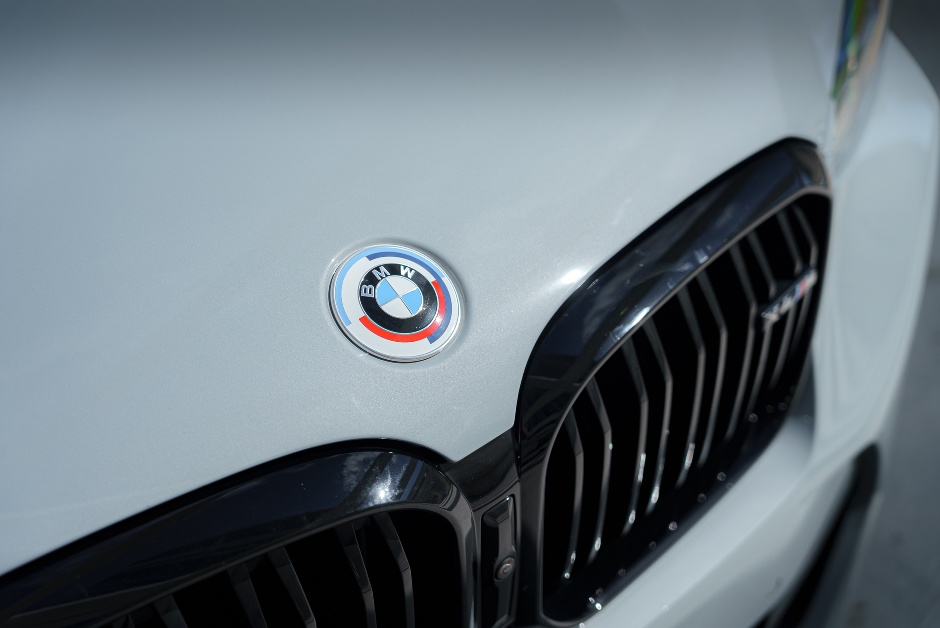 BMW X4M Black — exterior side view