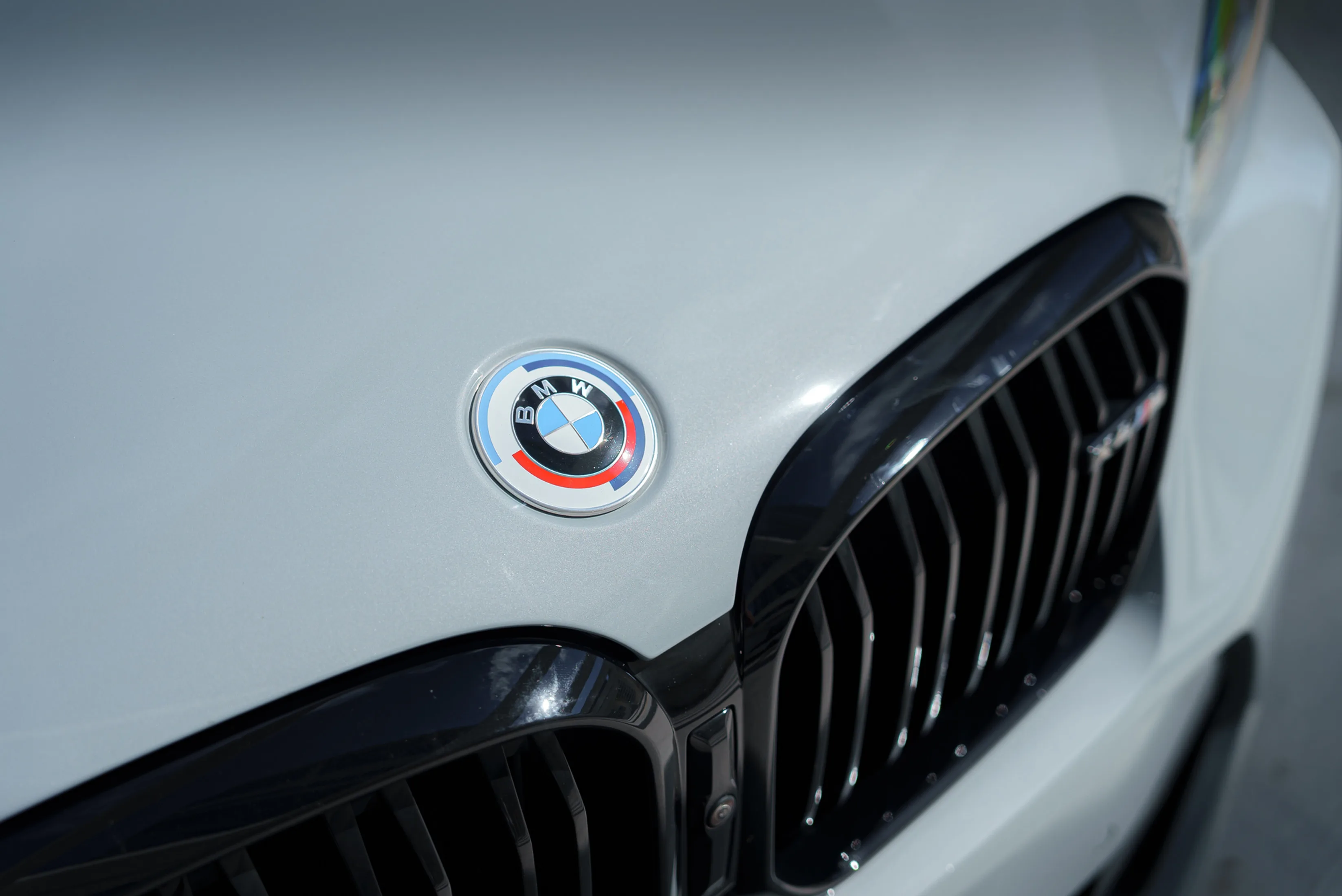 BMW X4M Black — exterior side view