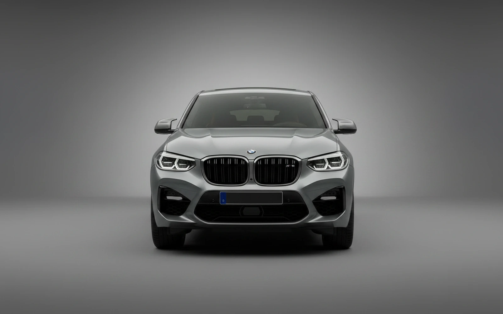 BMW X4M Competition Grey 2022 — exterior side view