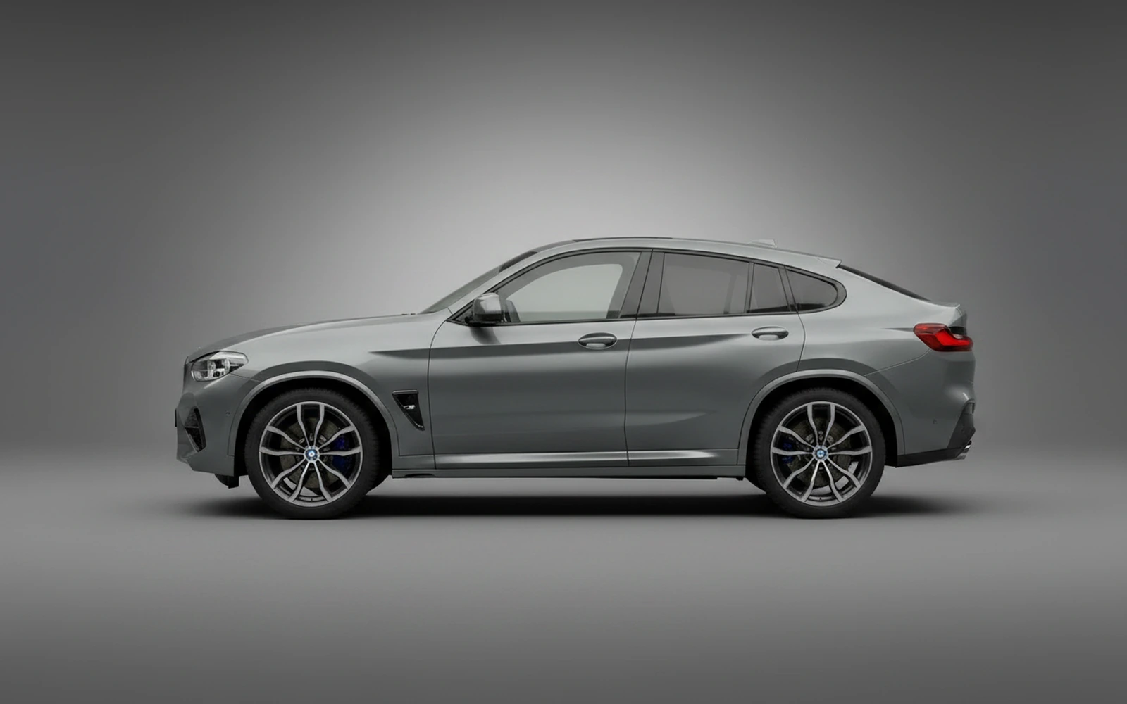 BMW X4M Competition Grey 2022 — exterior rear view