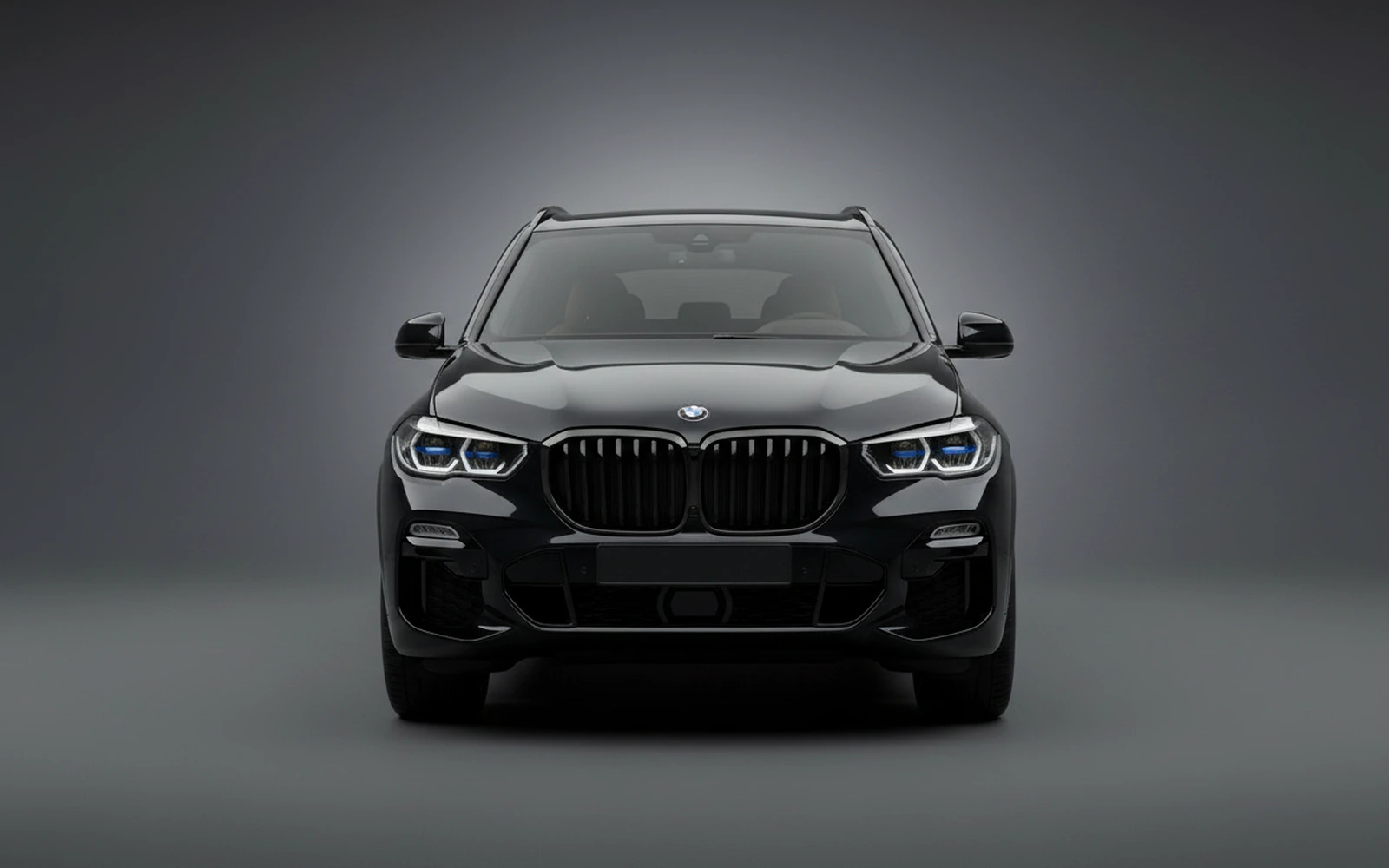 BMW X5 xDrive40i Black 2024 — exterior side view