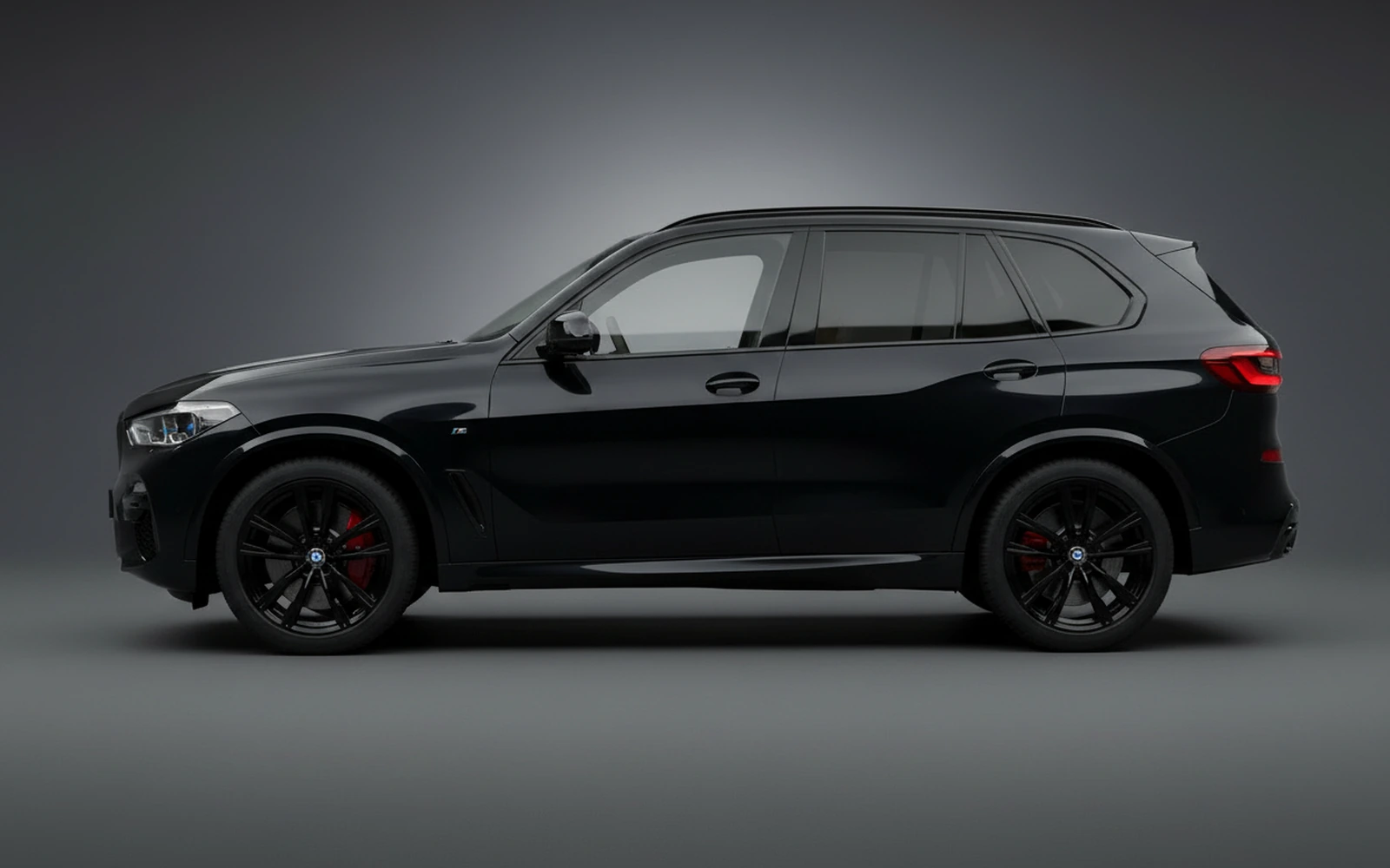 BMW X5 xDrive40i Black 2024 — exterior rear view
