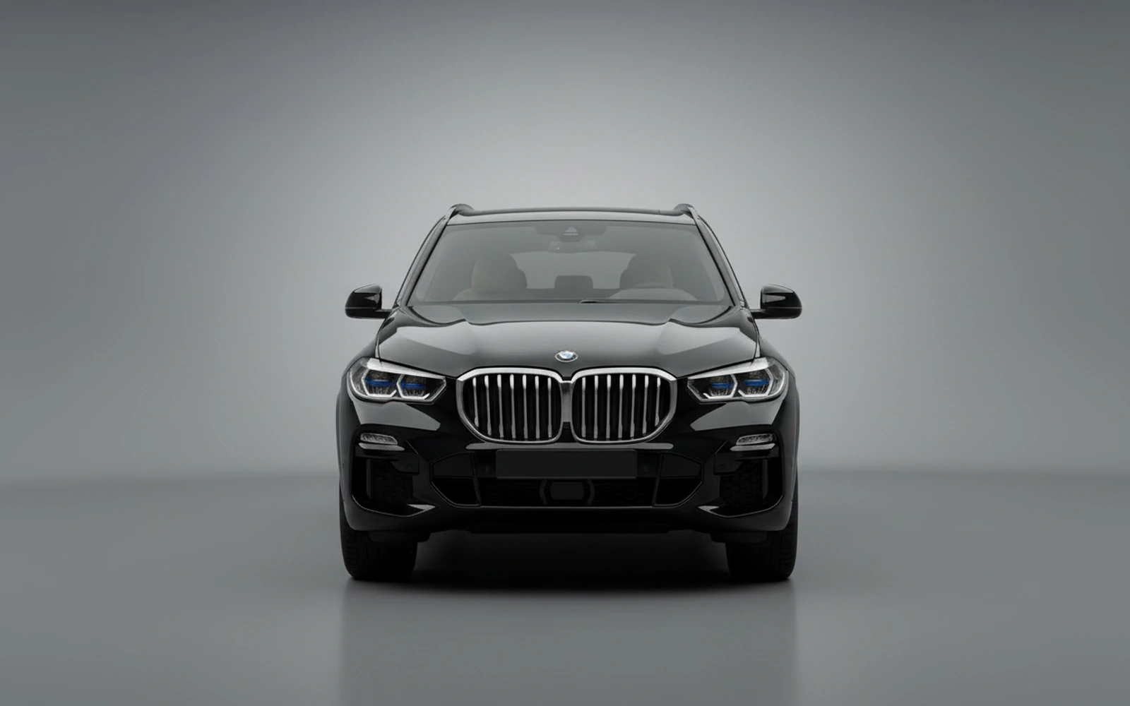 BMW X5 40i M-Sport Black 2025 — exterior side view