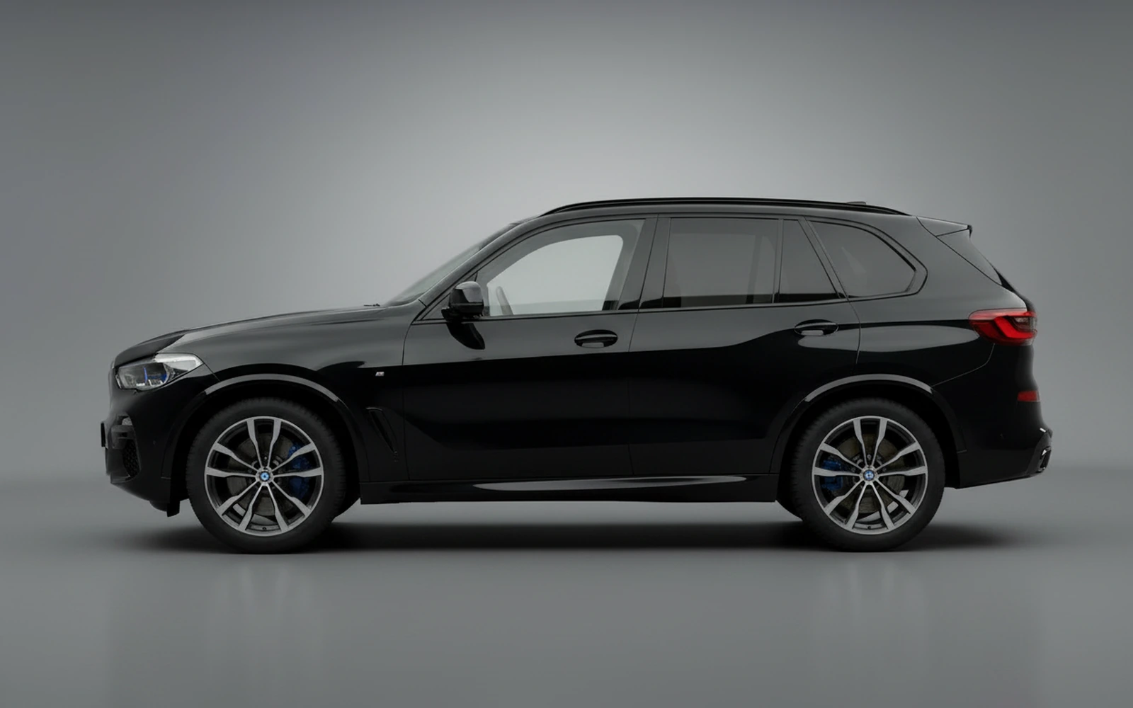 BMW X5 40i M-Sport Black 2025 — exterior rear view