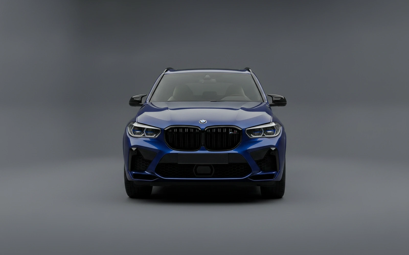 BMW X5m Competition Blue 2022 — exterior side view