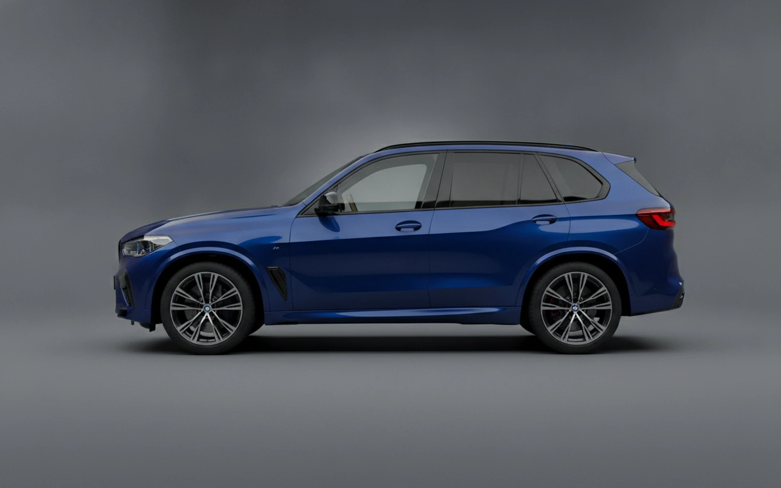 BMW X5m Competition Blue 2022 — exterior rear view