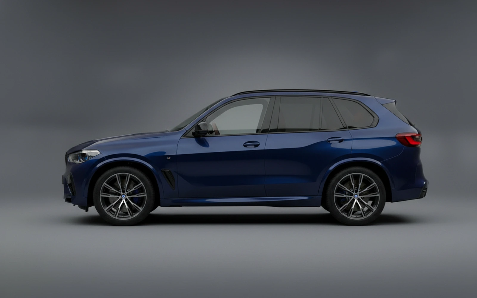 BMW X5m Competition Dark-blue 2023 — exterior rear view