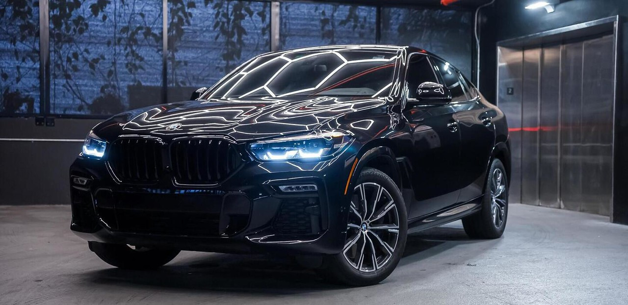 BMW X6 Black 2020 for rent in Miami — exterior photo