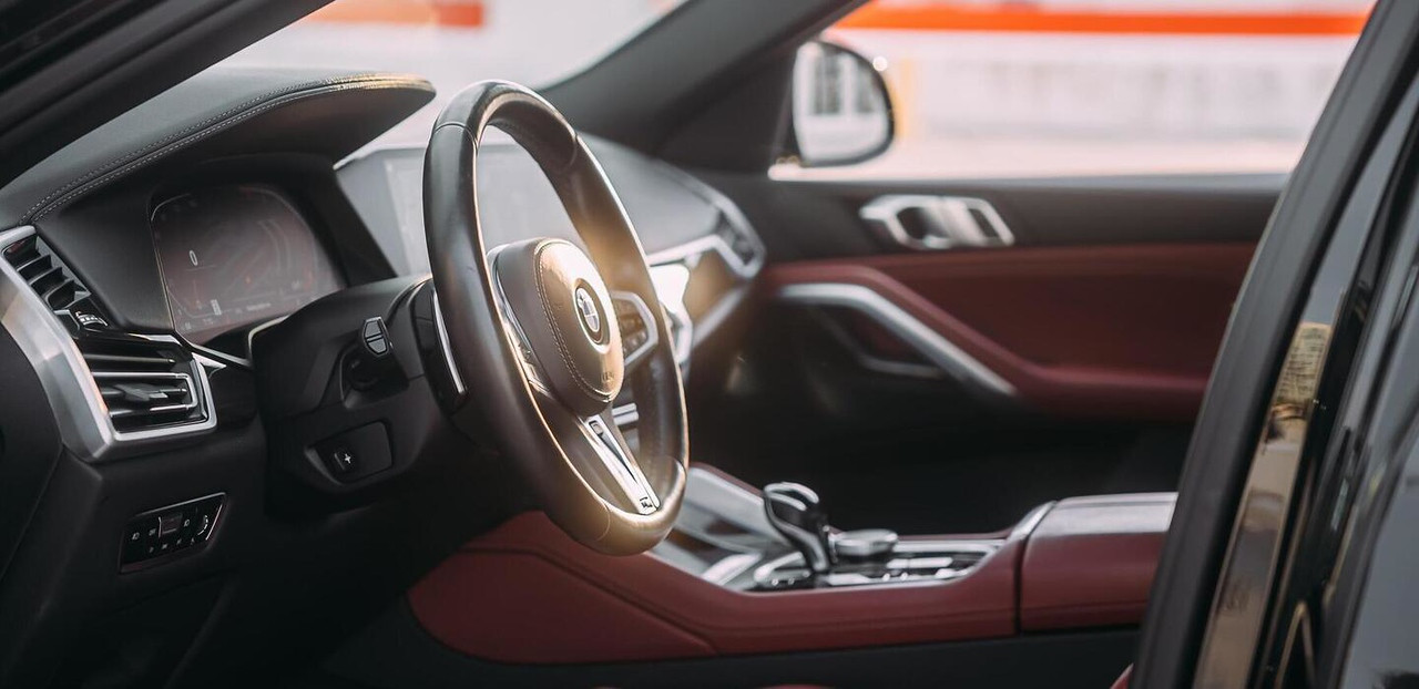 BMW X6 Black 2020 — exterior side view