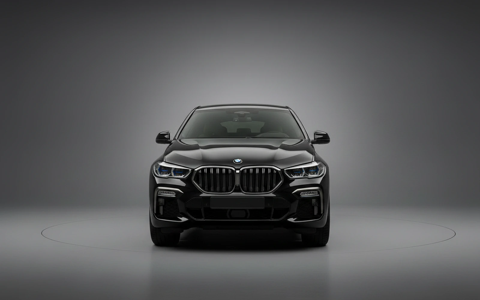 BMW X6 Black 2022 — exterior side view