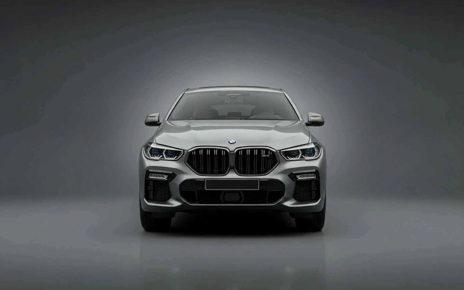 BMW X6 xDrive40i Grey 2023 — exterior side view