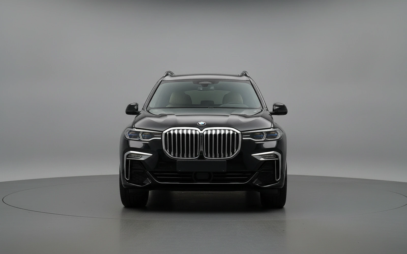 BMW X7 Black 2023 — exterior side view